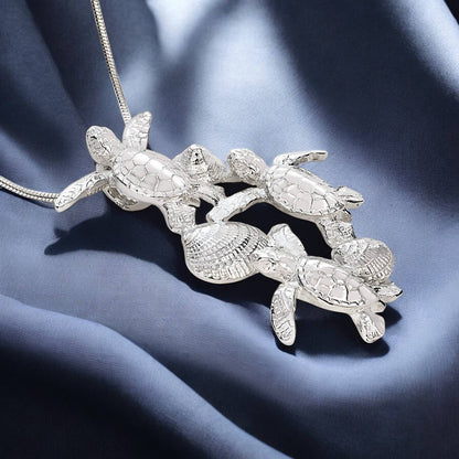 Big Blue by Roland St John - Ocean In Motion Hatchlings Pendant: 18"
